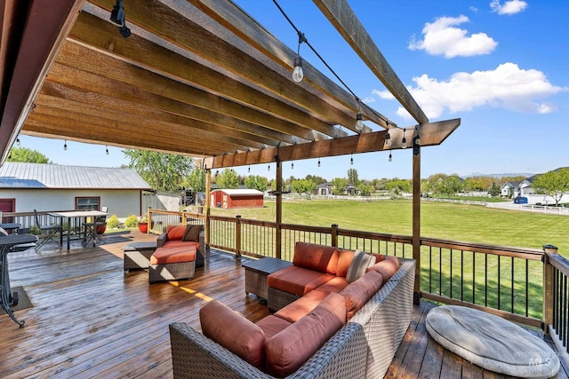 deck featuring a yard, an outdoor living space, and outdoor dining space