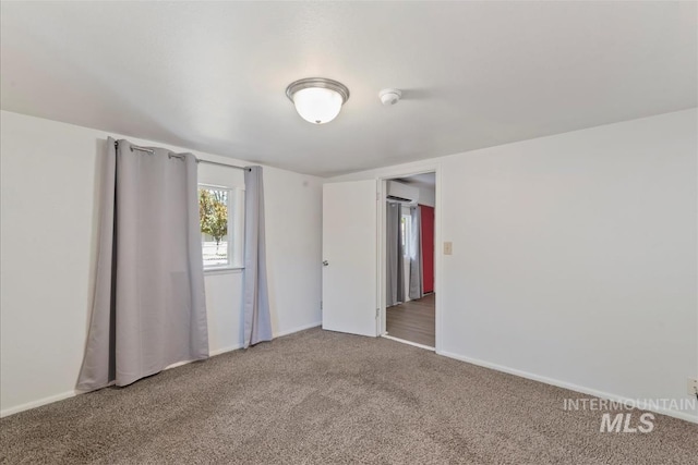 216 9th Ave N, Nampa, ID 83687 - spare room featuring carpet flooring, baseboards, and a smoke detector