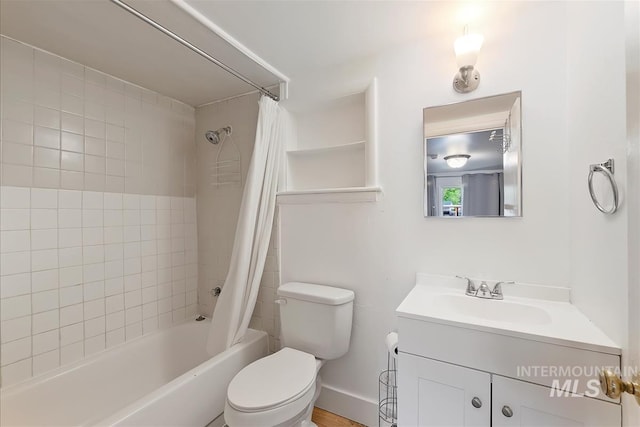 216 9th Ave N, Nampa, ID 83687 - bathroom with vanity, shower / bathtub combination with curtain, toilet, and baseboards