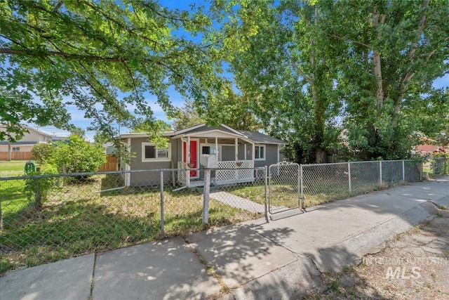 216 9th Ave N, Nampa, ID 83687 - view of front of home featuring a fenced front yard and a gate