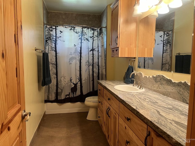 full bathroom featuring toilet, vanity, and shower / bath combination with curtain