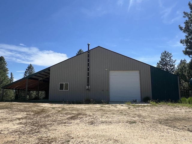 view of outbuilding featuring a garage