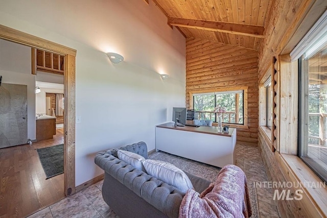 living room featuring rustic walls, baseboards, wood ceiling, beamed ceiling, and high vaulted ceiling