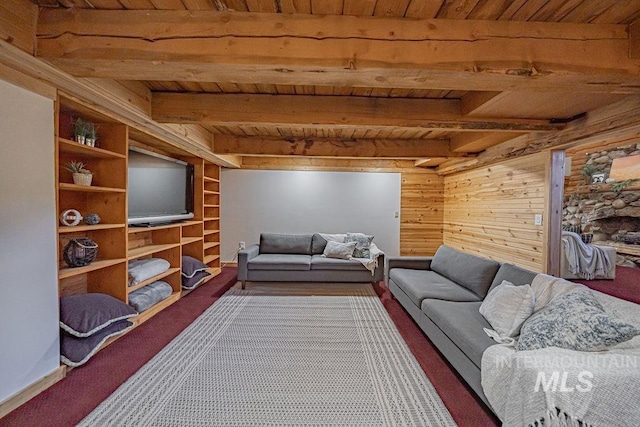 living area featuring carpet, wooden ceiling, and beam ceiling