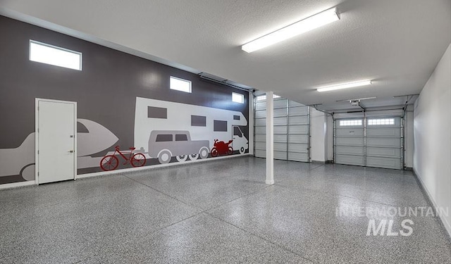 garage featuring baseboards