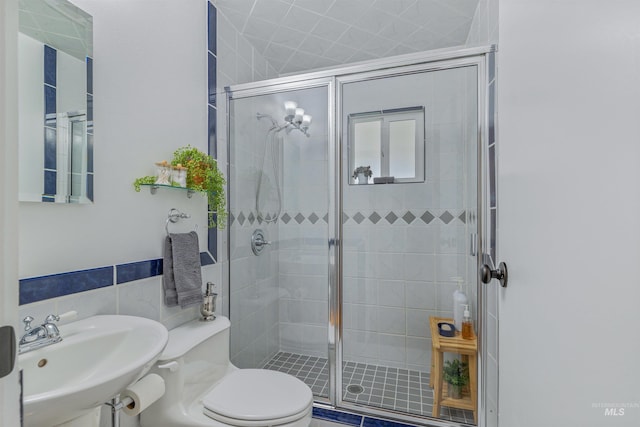 3233 8th St, Lewiston, ID 83501 - bathroom with toilet, a stall shower, and a sink