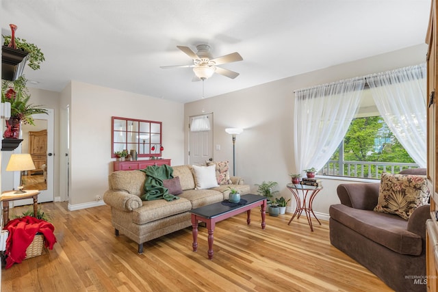 3233 8th St, Lewiston, ID 83501 - living room with light wood-type flooring, ceiling fan, and baseboards