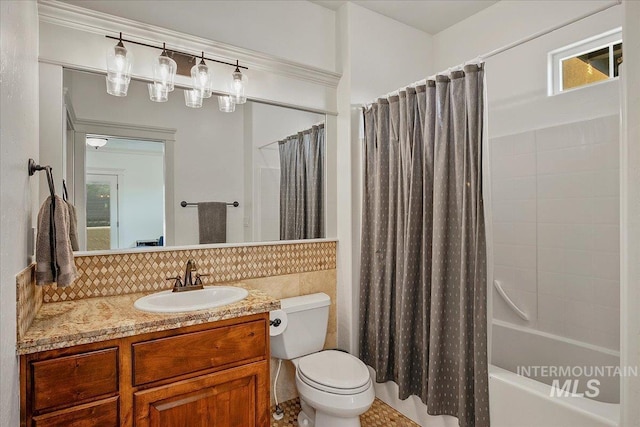 full bathroom with tasteful backsplash, vanity, shower / tub combo with curtain, and toilet