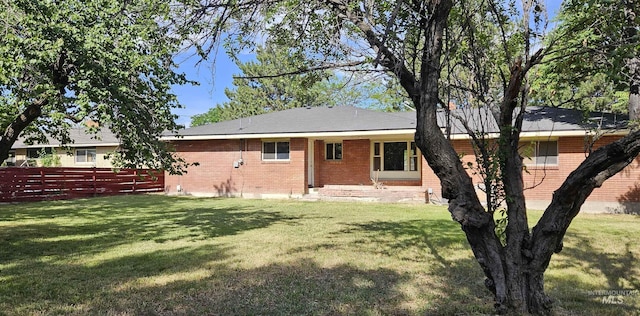 604 Monte Vis, Twin Falls, ID 83301 - rear view of house featuring brick siding