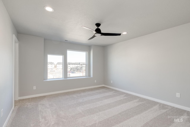 3542 W Littleton Dr, Meridian, ID 83642 - unfurnished room with a ceiling fan, recessed lighting, light carpet, and baseboards