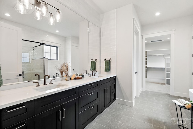 bathroom with vanity and walk in shower