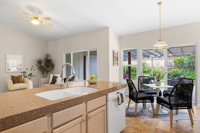 6460 S Lodgepole Pl, Boise, ID 83716 - kitchen with a sink, dishwasher, hanging light fixtures, ceiling fan, and vaulted ceiling
