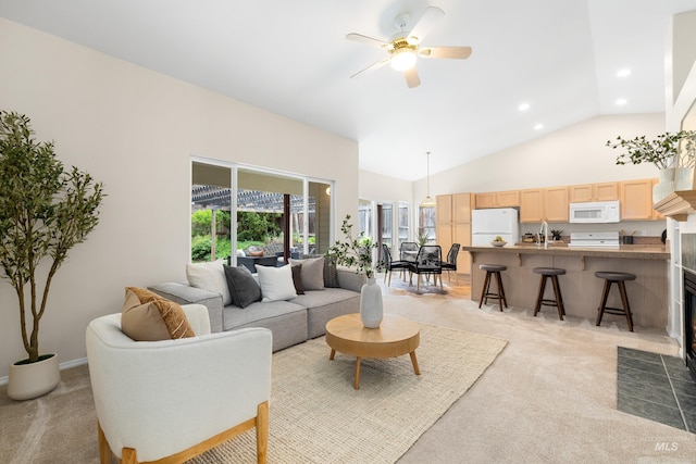 6460 S Lodgepole Pl, Boise, ID 83716 - living room with light carpet, ceiling fan, high vaulted ceiling, and recessed lighting
