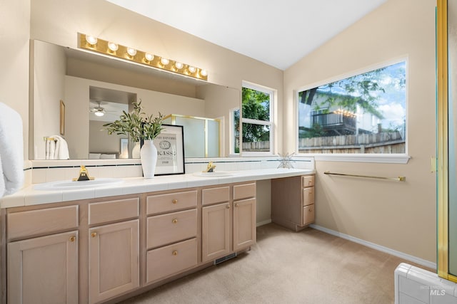6460 S Lodgepole Pl, Boise, ID 83716 - bathroom with double vanity, a shower with door, baseboards, lofted ceiling, and a ceiling fan
