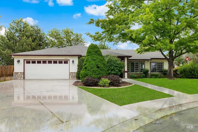 6460 S Lodgepole Pl, Boise, ID 83716 - ranch-style house with stone siding, concrete driveway, an attached garage, and a shingled roof