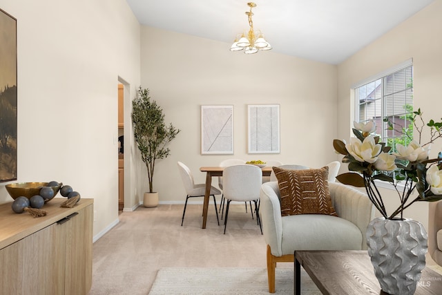 6460 S Lodgepole Pl, Boise, ID 83716 - dining room with a chandelier, light colored carpet, baseboards, and lofted ceiling
