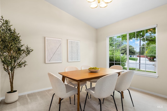 6460 S Lodgepole Pl, Boise, ID 83716 - dining room with light carpet, baseboards, plenty of natural light, and vaulted ceiling