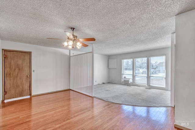 412 N Purdue St, Boise, ID 83706 - unfurnished room with ceiling fan, wood finished floors, and a textured ceiling