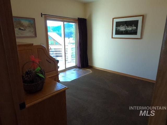 204 S 2nd St, Elk River, ID 83827 - entryway featuring healthy amount of natural light and carpet flooring