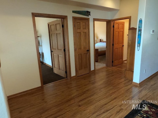 204 S 2nd St, Elk River, ID 83827 - spare room featuring wood finished floors and baseboards