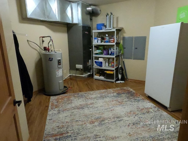 204 S 2nd St, Elk River, ID 83827 - utilities featuring electric water heater, electric panel, and heating unit