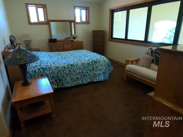 204 S 2nd St, Elk River, ID 83827 - carpeted bedroom featuring baseboards