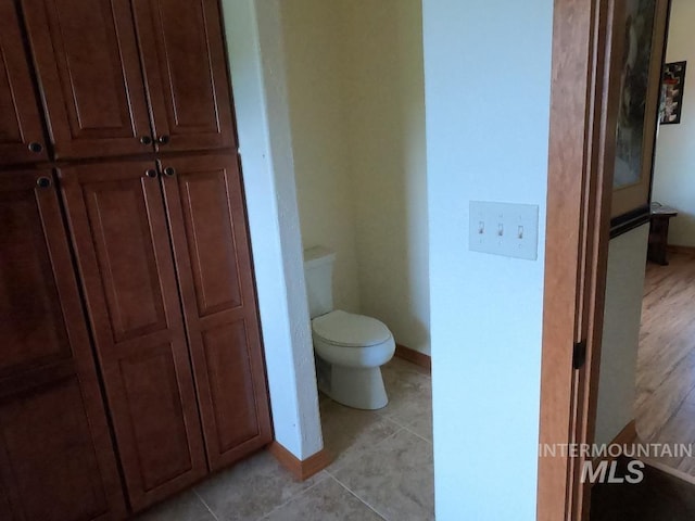 204 S 2nd St, Elk River, ID 83827 - bathroom featuring toilet and tile patterned floors