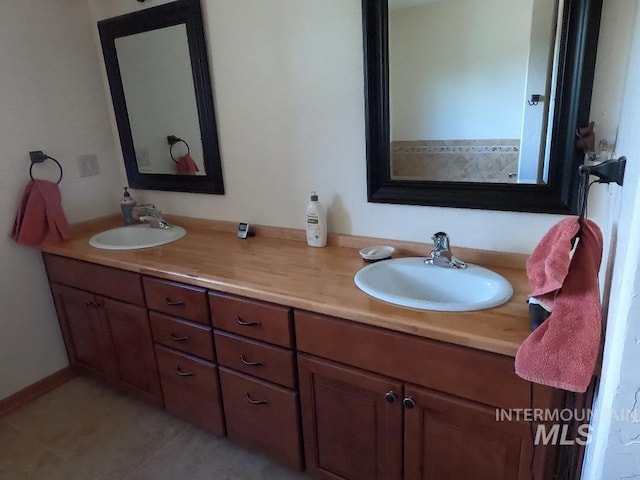 204 S 2nd St, Elk River, ID 83827 - full bath featuring double vanity and tile patterned flooring