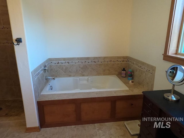 204 S 2nd St, Elk River, ID 83827 - full bathroom featuring a garden tub and tile patterned flooring