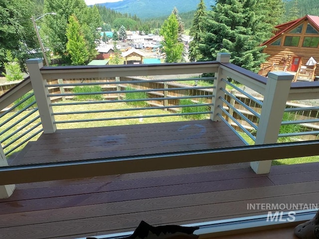 204 S 2nd St, Elk River, ID 83827 - deck with a mountain view