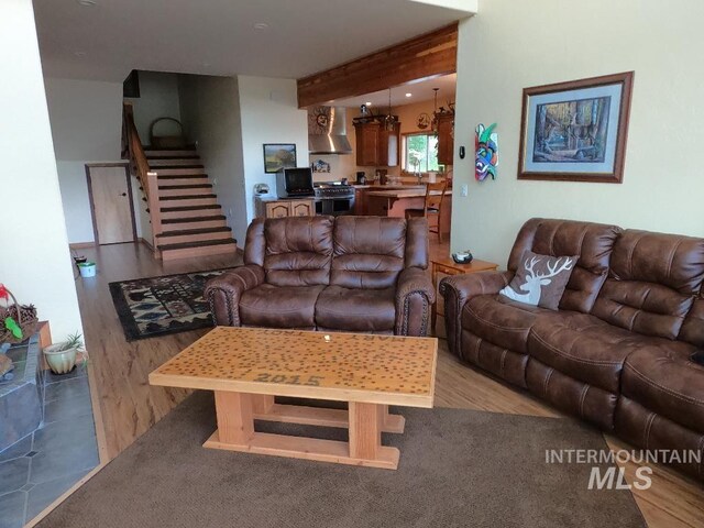 204 S 2nd St, Elk River, ID 83827 - living room featuring stairway and light wood-style flooring