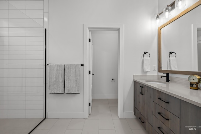 bathroom featuring tile patterned floors and vanity