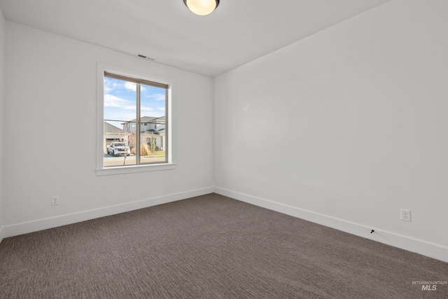 view of carpeted spare room