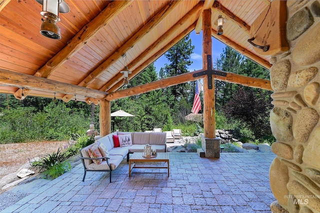 view of patio featuring an outdoor hangout area and a gazebo