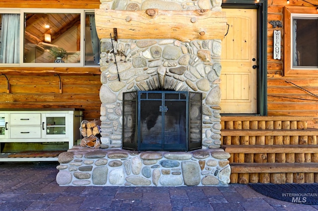 details featuring a stone fireplace