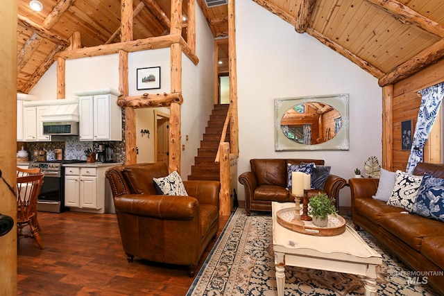 living area with high vaulted ceiling, beamed ceiling, dark wood finished floors, and wood ceiling