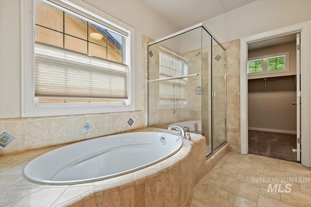 12970 N 9th Ave, Boise, ID 83714 - bathroom featuring a shower stall, a bath, and tile patterned flooring