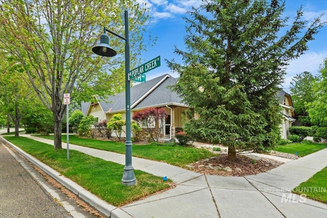 12970 N 9th Ave, Boise, ID 83714 - obstructed view of property with a front lawn