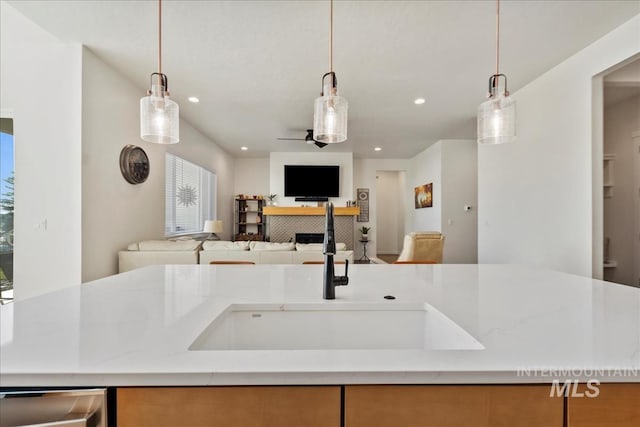 8237 W Corinthia St, Eagle, ID 83616 - kitchen featuring open floor plan, recessed lighting, a ceiling fan, and decorative light fixtures