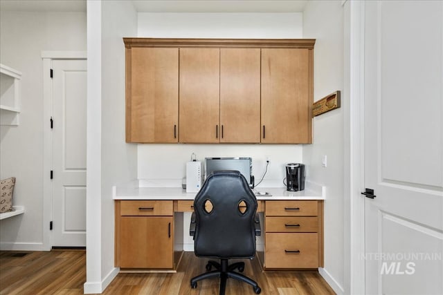 8237 W Corinthia St, Eagle, ID 83616 - office with wood finished floors and built in study area