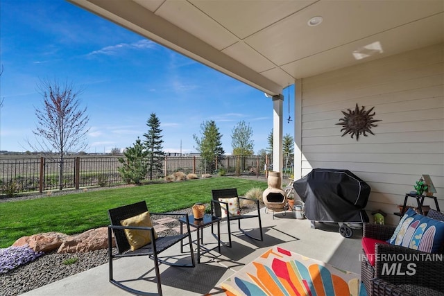 8237 W Corinthia St, Eagle, ID 83616 - fenced backyard featuring a patio and a grill