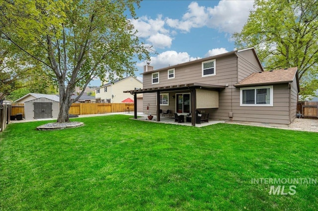 back of property with a lawn, a fenced backyard, a storage unit, an outdoor structure, and a patio area