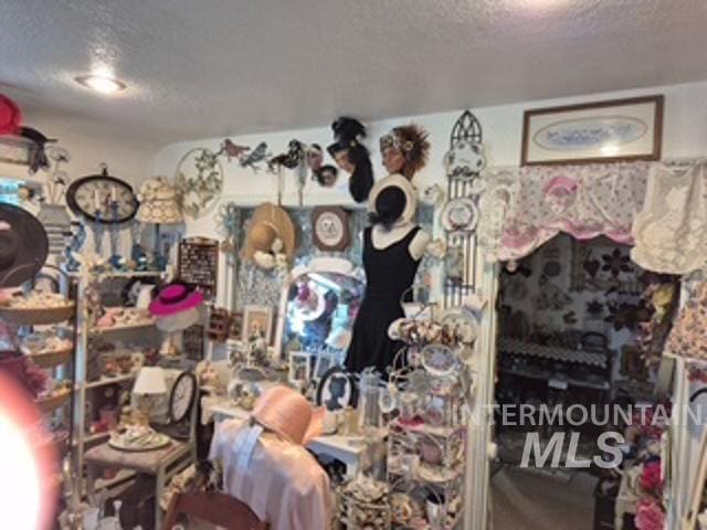 504 E Grove Ave, Parma, ID 83660 - misc room with a textured ceiling