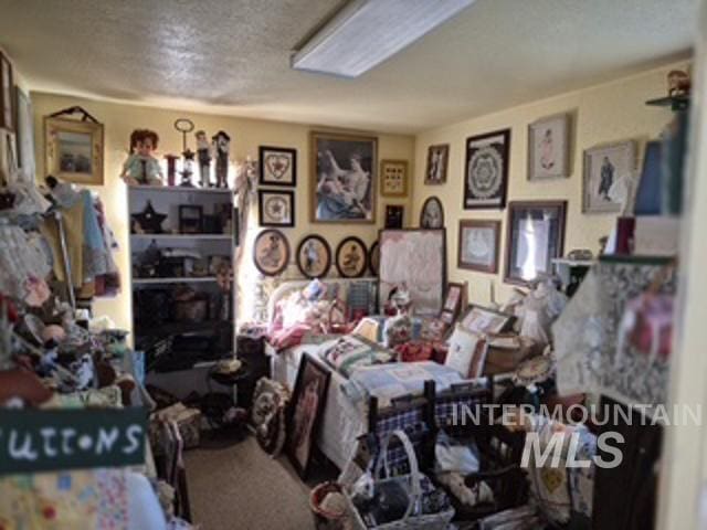 504 E Grove Ave, Parma, ID 83660 - bedroom featuring carpet flooring