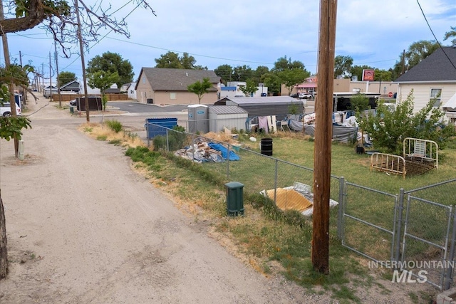 504 E Grove Ave, Parma, ID 83660 - view of dirt / gravel road with a residential view