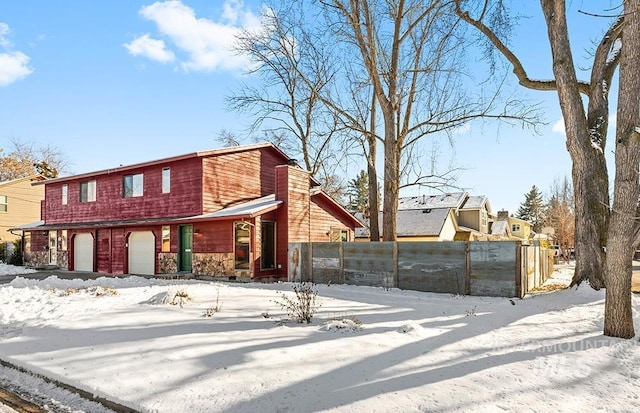 view of front of property featuring a garage