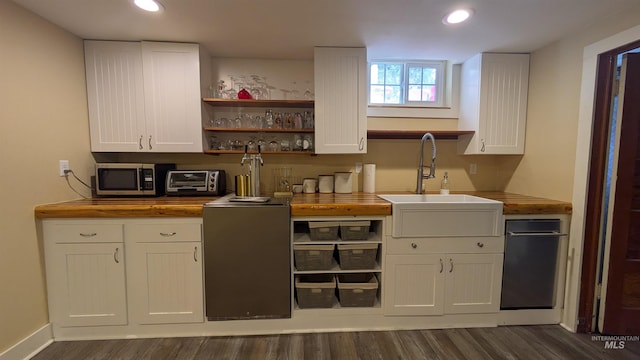 815 E 6th, Moscow, ID 83843 - kitchen featuring wood counters, stainless steel microwave, dark wood finished floors, open shelves, and recessed lighting