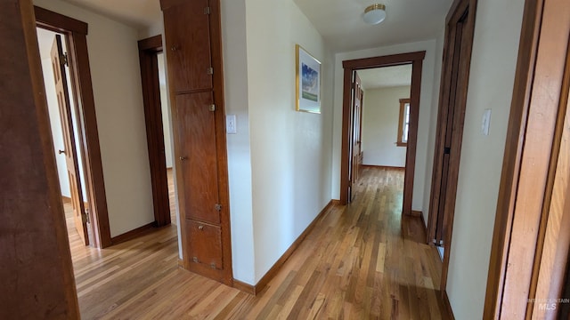 815 E 6th, Moscow, ID 83843 - hall featuring light wood finished floors and baseboards