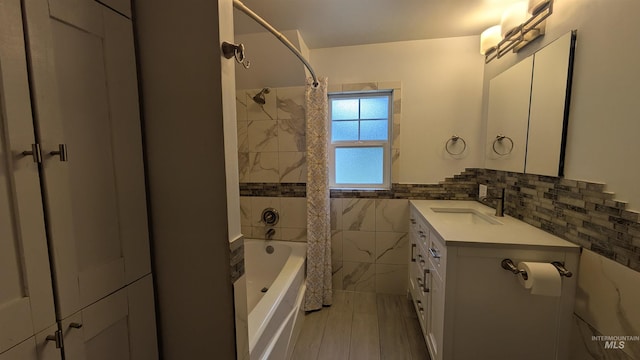 815 E 6th, Moscow, ID 83843 - full bathroom with tile walls, vanity, shower / bathtub combination, and a wainscoted wall