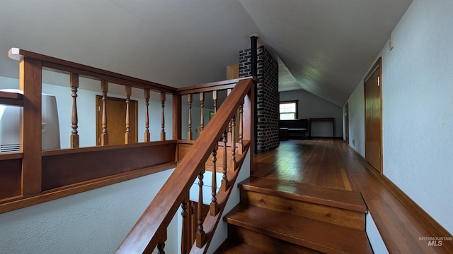 815 E 6th, Moscow, ID 83843 - stairway featuring vaulted ceiling and hardwood / wood-style floors
